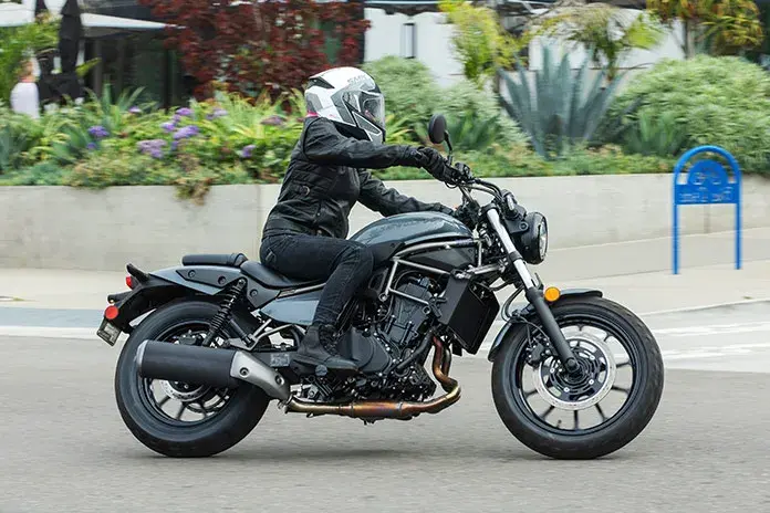 Top 6 Motorcycles Favored by Short Women in 2025 women riding Kawasaki Eliminator